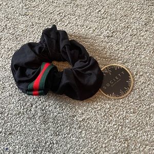 black scrunchie with green/red ribbon